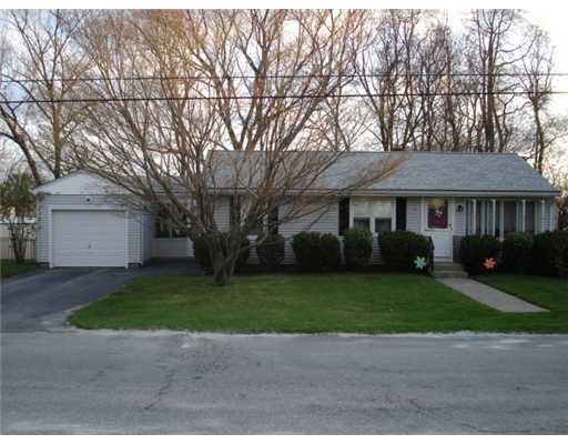 Exterior Front. Vinyl Sided, replacement windows, attached garage and breezeway.  Newer roof and central air as well.