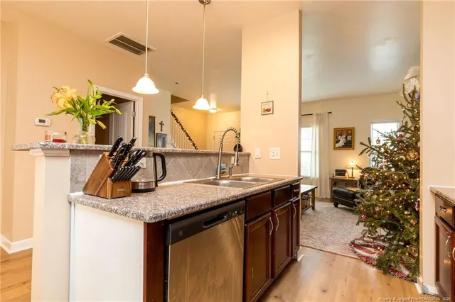 a bathroom with a sink mirror and toilet