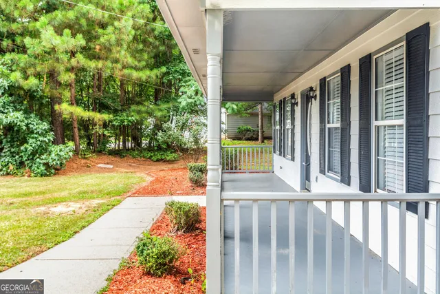 a view of porch with a backyard