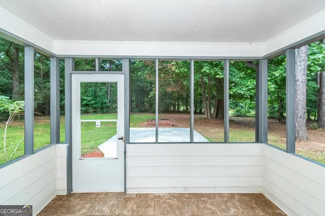 a view of porch with a backyard