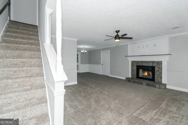a view of a livingroom with a fireplace