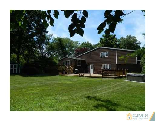 5 Hamlin Road East Brunswick, NJ 08816 - Photo 4 of 16 a view of house with backyard