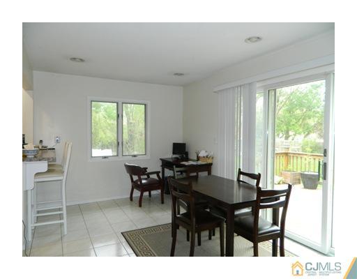 5 Hamlin Road East Brunswick, NJ 08816 - Photo 7 of 16 a view of a dining room with furniture and a window