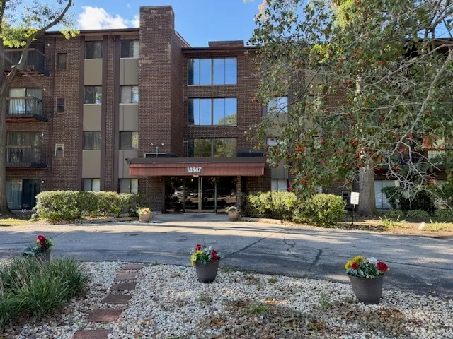 a front view of a building with street view