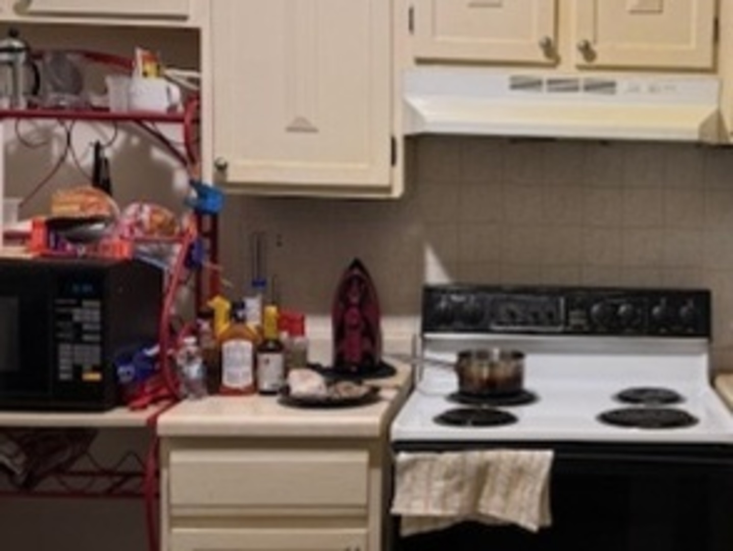 14647 Greenwood Road, Unit 312 Dolton, IL 60419 - Photo 3 of 12 a kitchen with a sink and cabinets