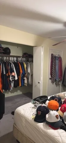 a bed room with a bed and a couch