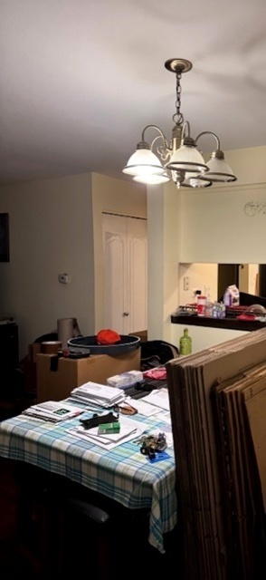 14647 Greenwood Road, Unit 312 Dolton, IL 60419 - Photo 9 of 12 a kitchen with a counter top space appliances and cabinets