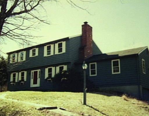 20 Flat Swamp Road Newtown, CT 06470 - Photo 1 of 1 a front view of a house with a yard
