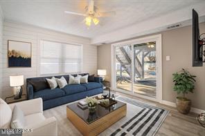 12 6th Street Barnegat, NJ 08005 - Photo 16 of 37 a living room with furniture and a large window