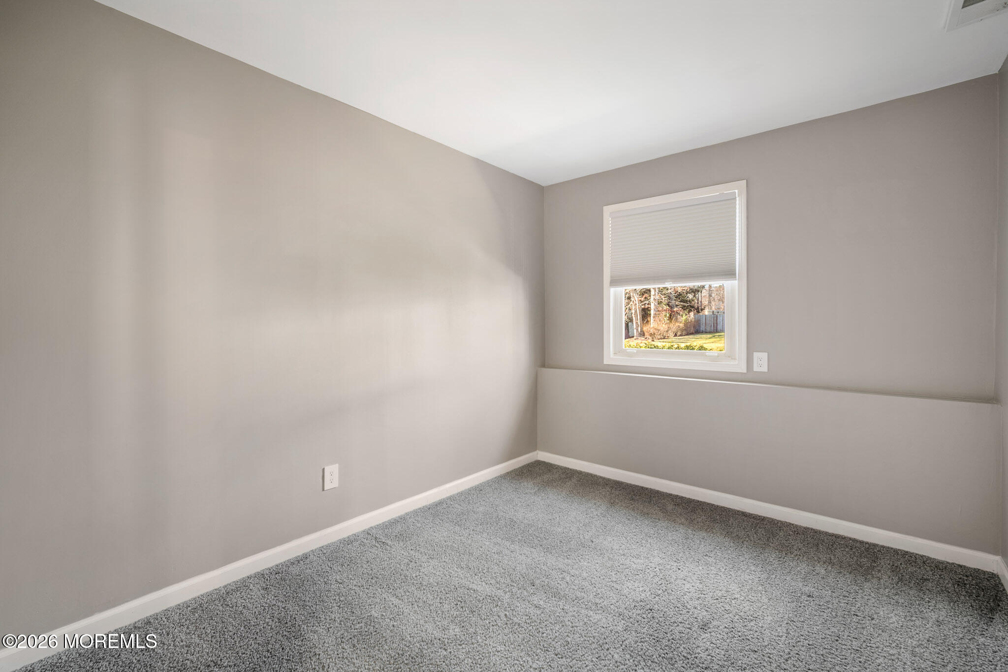 12 6th Street Barnegat, NJ 08005 - Photo 8 of 37 an empty room with a window