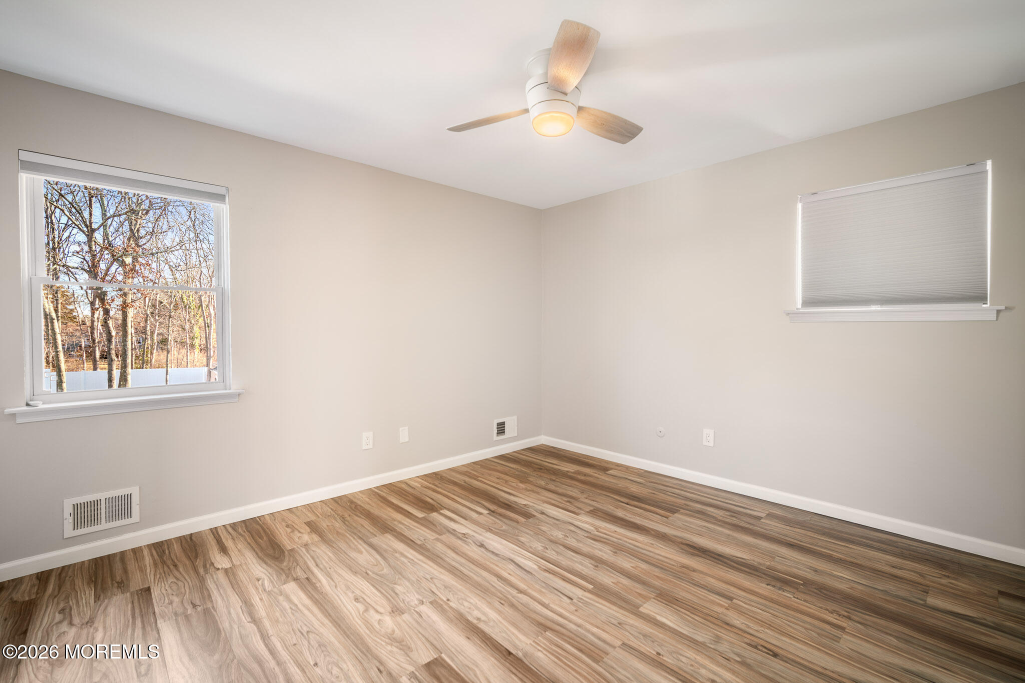 12 6th Street Barnegat, NJ 08005 - Photo 10 of 37 a view of empty room with wooden floor