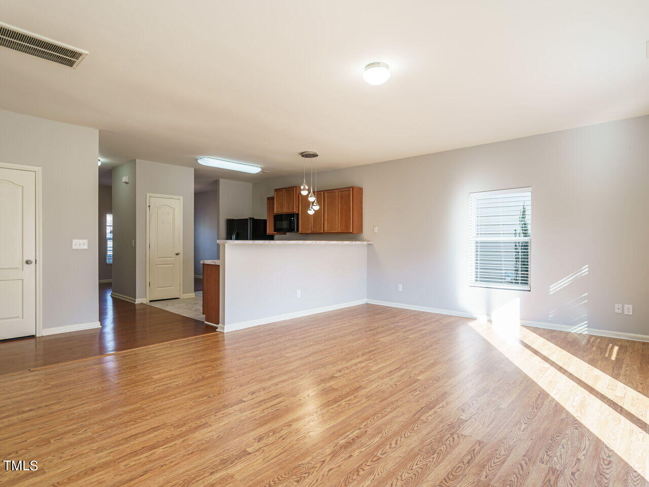 3709 Madeline Way Raleigh, NC 27610 - Photo 11 of 29 a view of a kitchen with a sink and a window