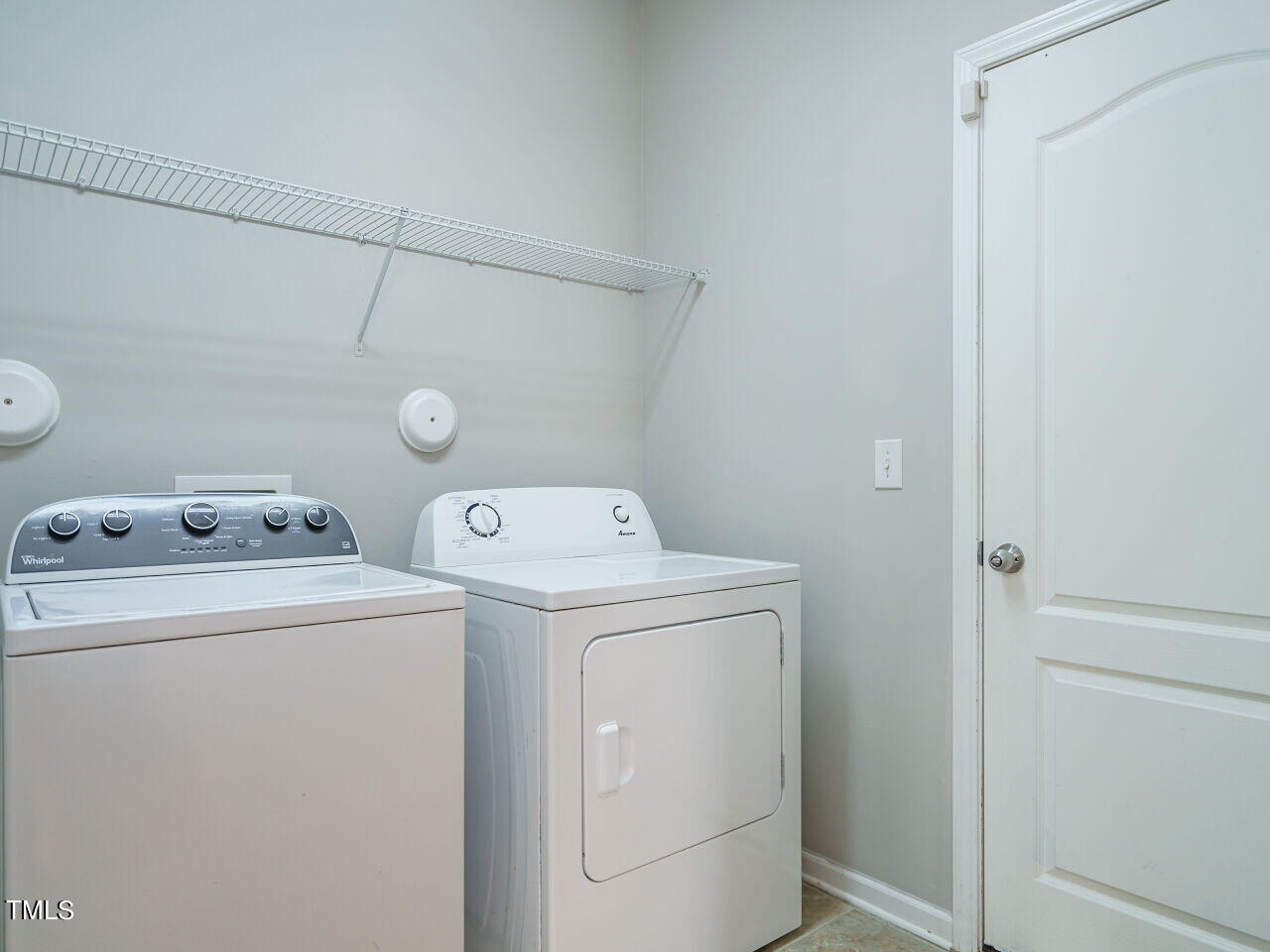 3709 Madeline Way Raleigh, NC 27610 - Photo 17 of 29 a utility room with dryer and washer