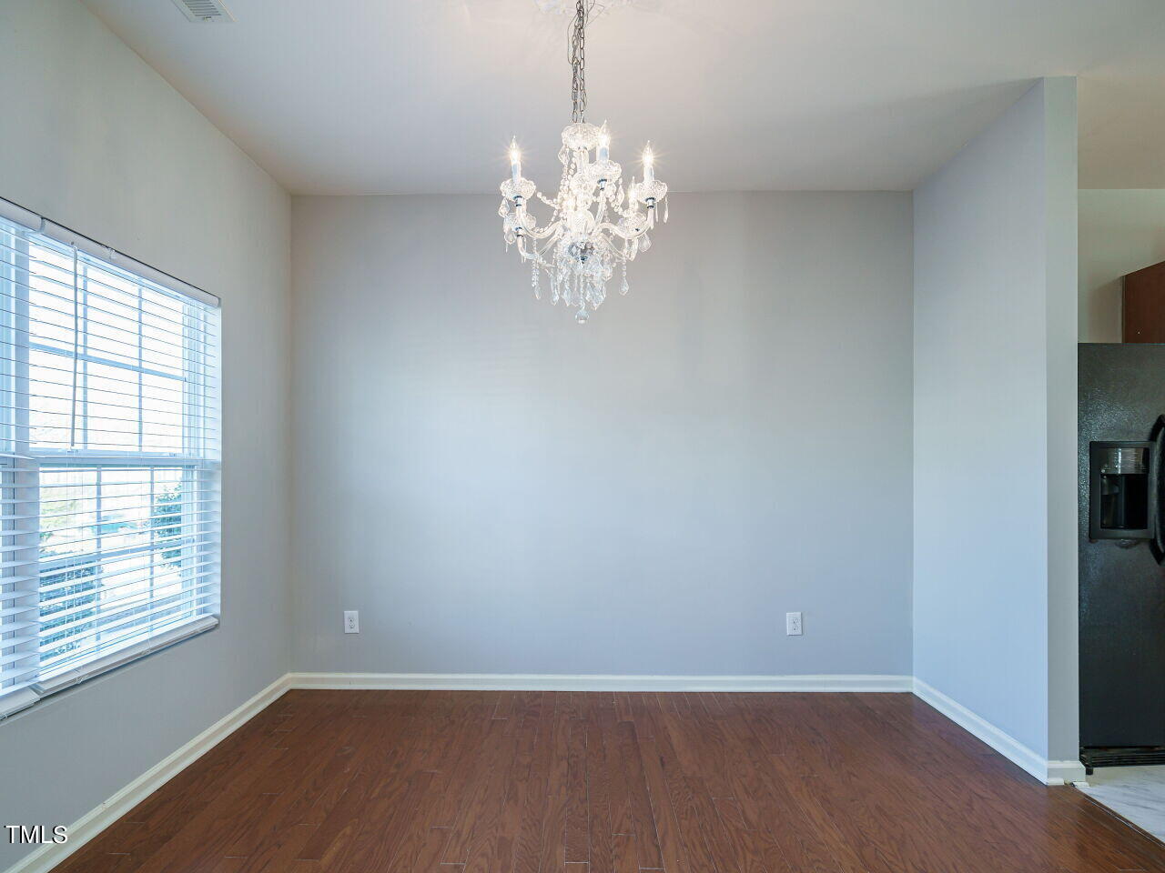 3709 Madeline Way Raleigh, NC 27610 - Photo 6 of 29 a view of a chandelier in big room and chandelier