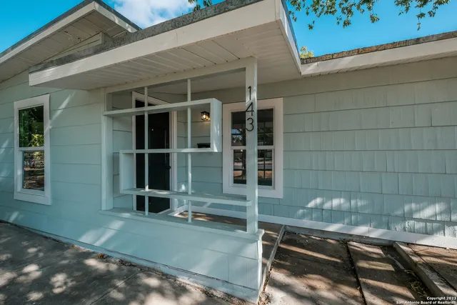 a view of a door and a chair