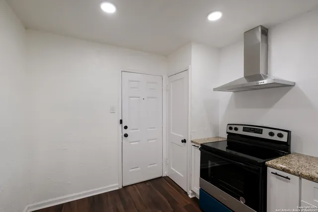 a view of a kitchen with a stove