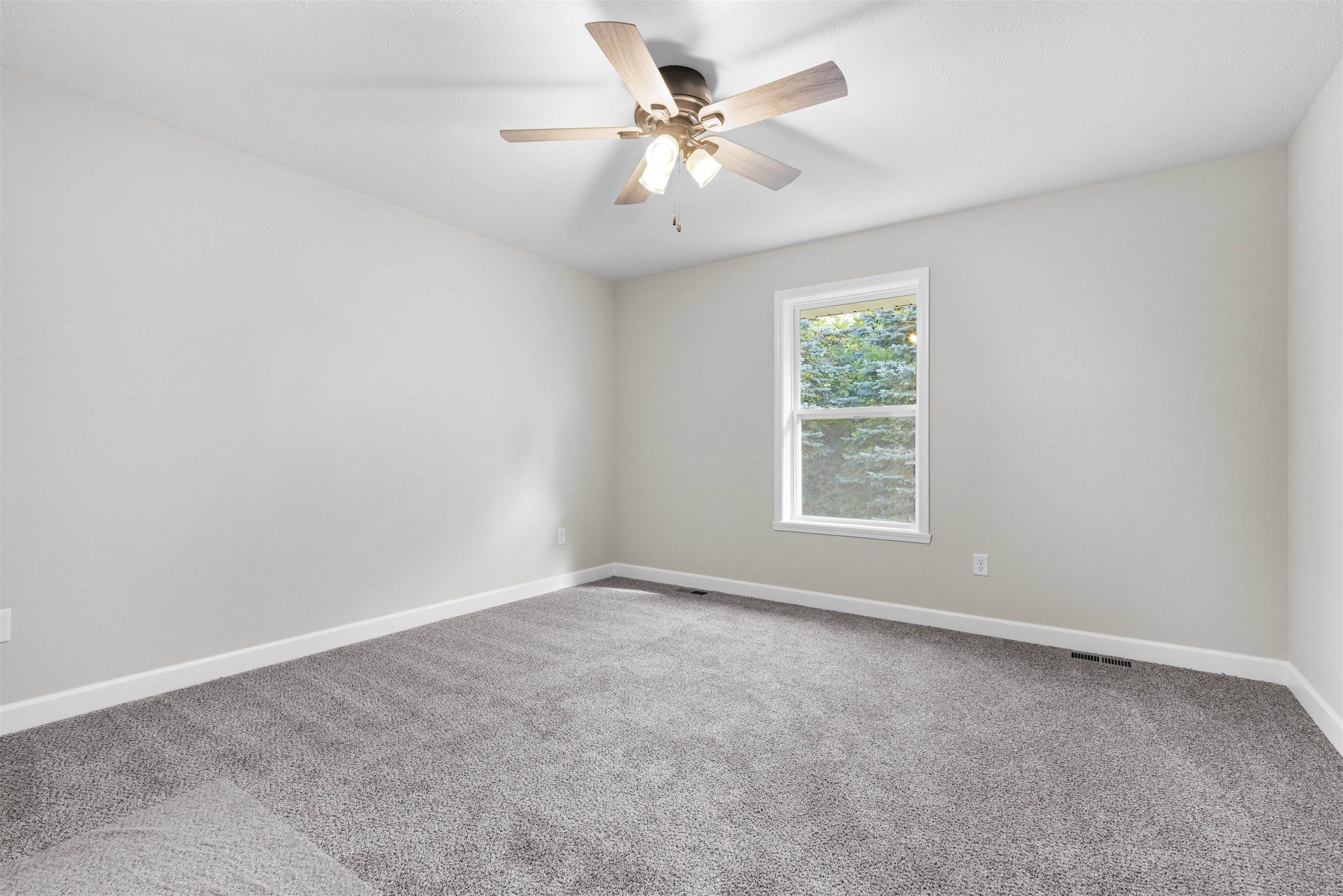 7743 Cherry Hill Road Cherry Valley, IL 61016 - Photo 14 of 18 a view of an empty room with a window