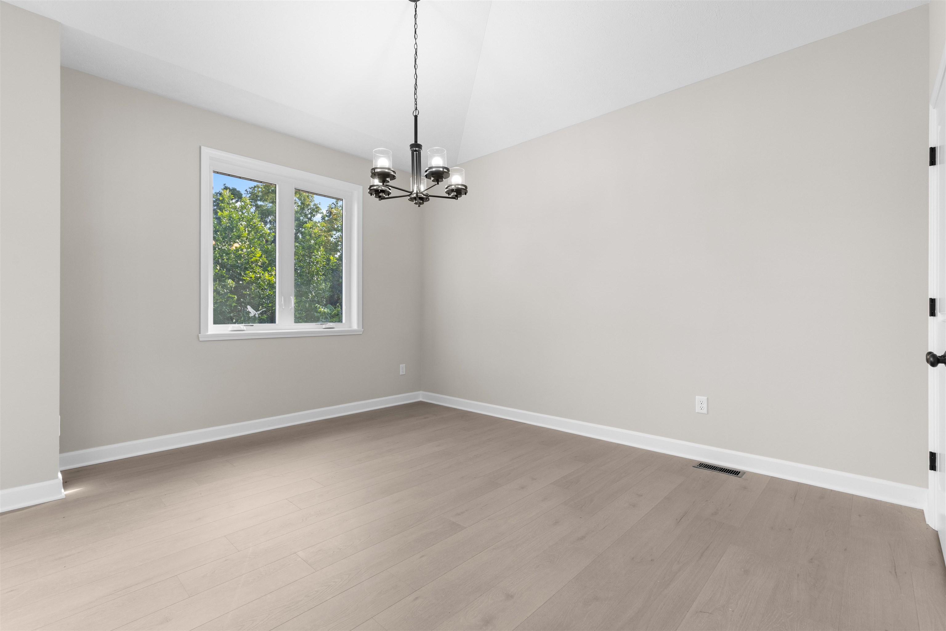 7743 Cherry Hill Road Cherry Valley, IL 61016 - Photo 7 of 18 a view of an empty room with a window