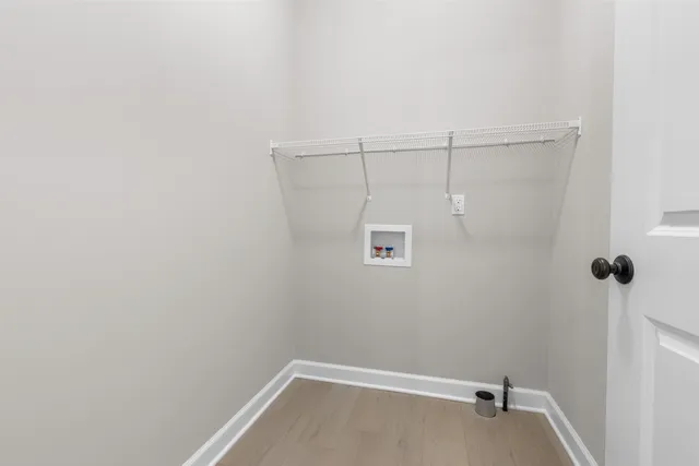 a view of a room with racks on the wall