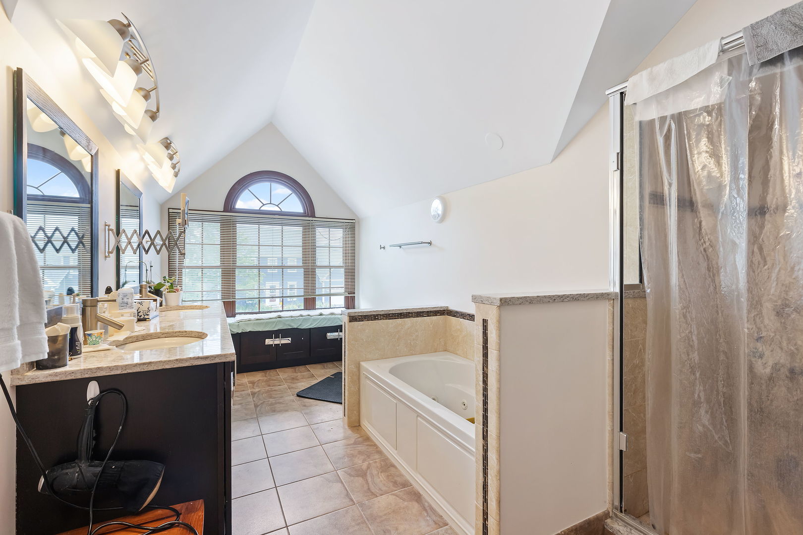2647 Sun Valley Road Lisle, IL 60532 - Photo 16 of 26 a large spacious bathroom with a bathtub and a sink