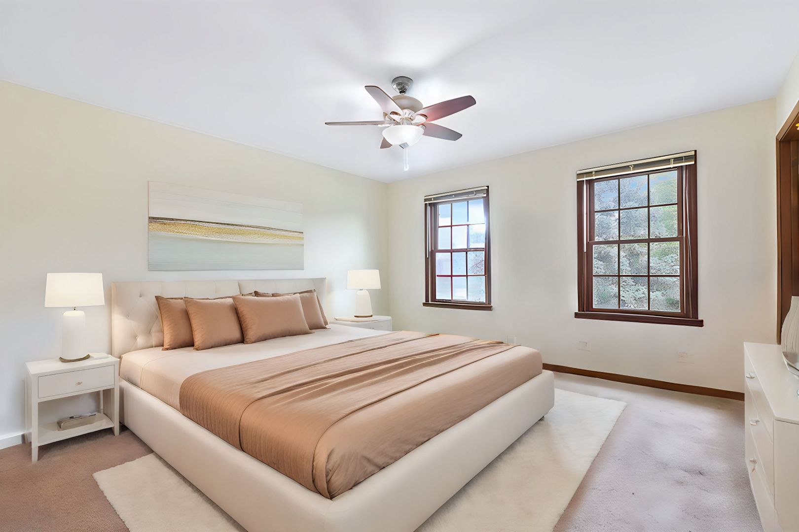 2647 Sun Valley Road Lisle, IL 60532 - Photo 17 of 26 a bedroom with a large bed and a chandelier