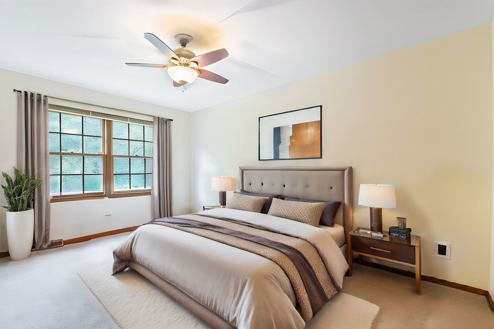2647 Sun Valley Road Lisle, IL 60532 - Photo 18 of 26 a bed room with a bed and a ceiling fan