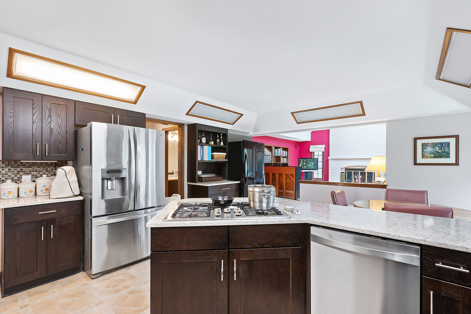 2647 Sun Valley Road Lisle, IL 60532 - Photo 9 of 26 a kitchen with granite countertop a sink stainless steel appliances and cabinets