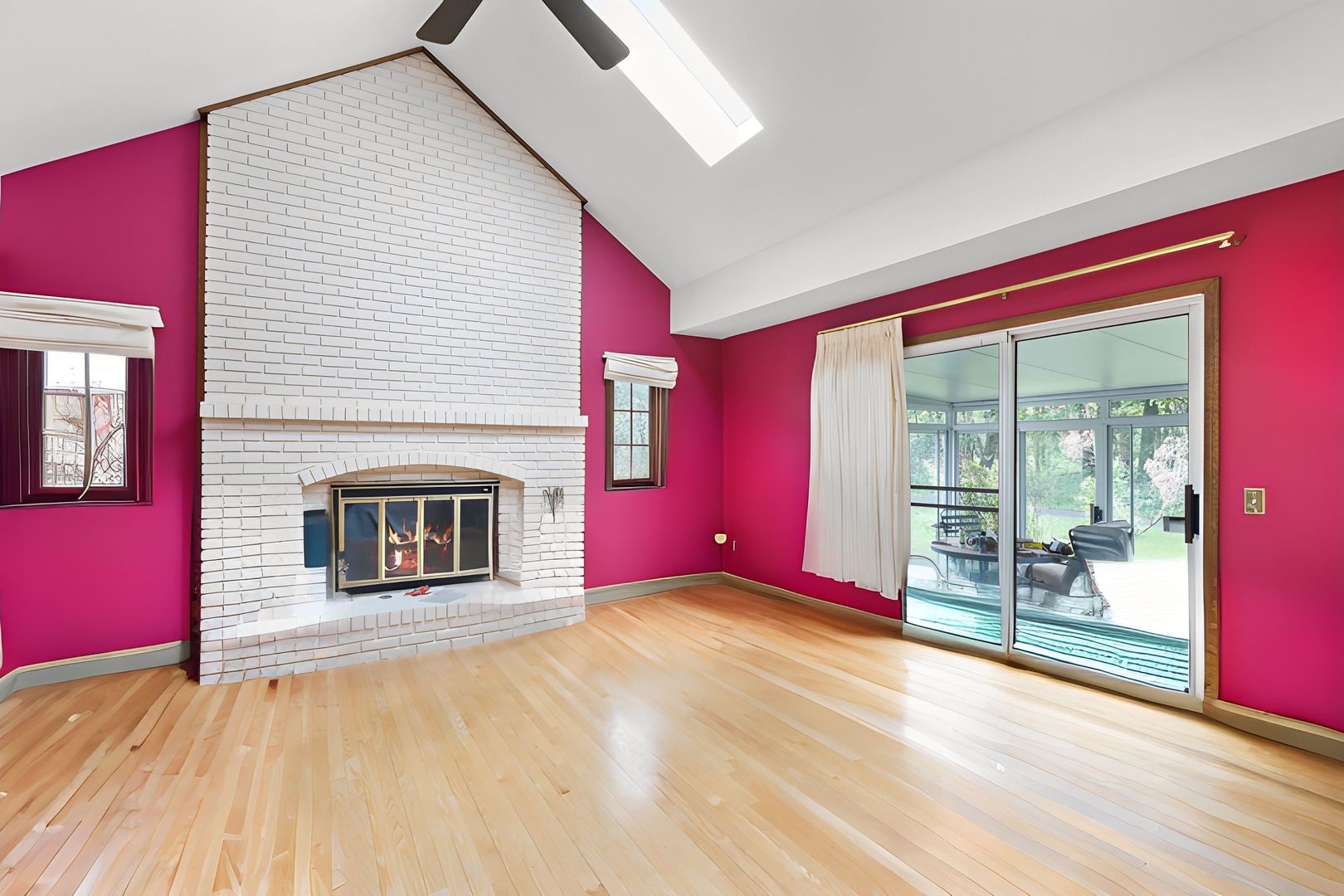 2647 Sun Valley Road Lisle, IL 60532 - Photo 10 of 26 a view of empty room with floor to ceiling window and fireplace