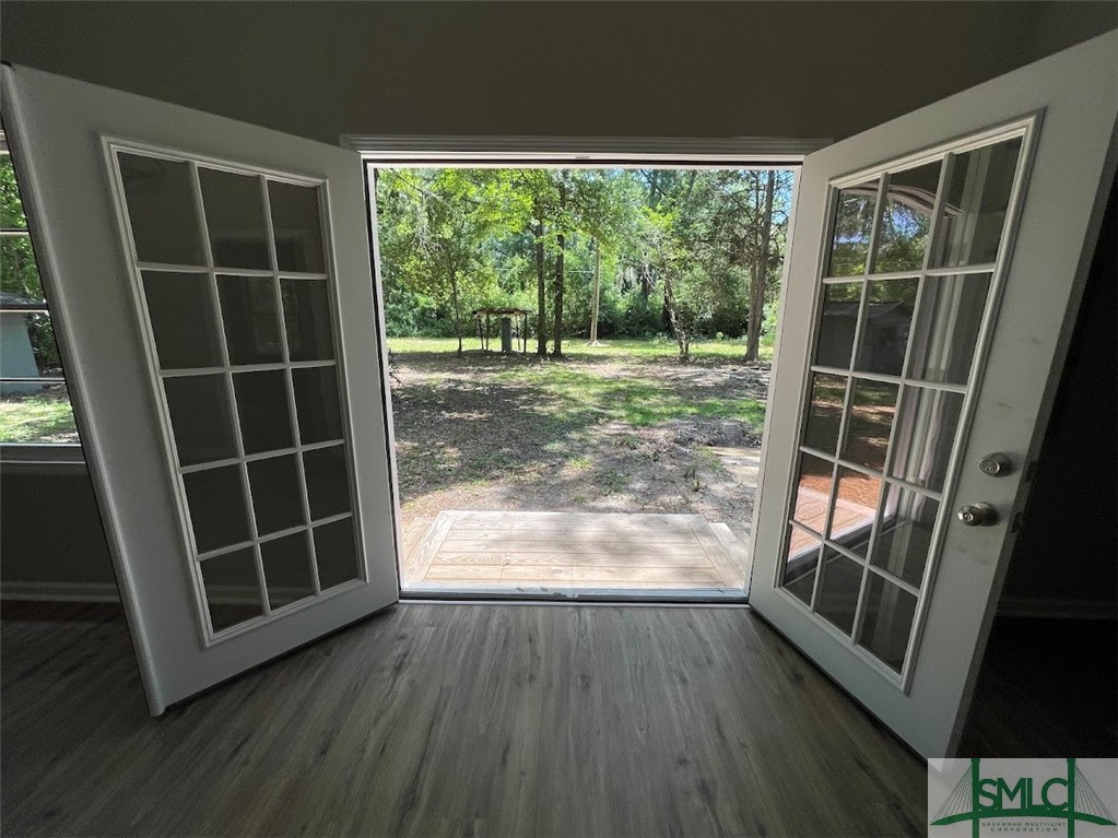 467 McLaws Road Guyton, GA 31312 - Photo 21 of 28 French doors welcome you outside.