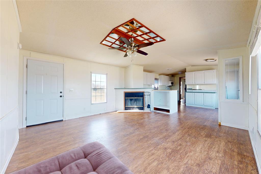 206 Creekview Meadows Court Springtown, TX 76082 - Photo 4 of 13 White House Living Room