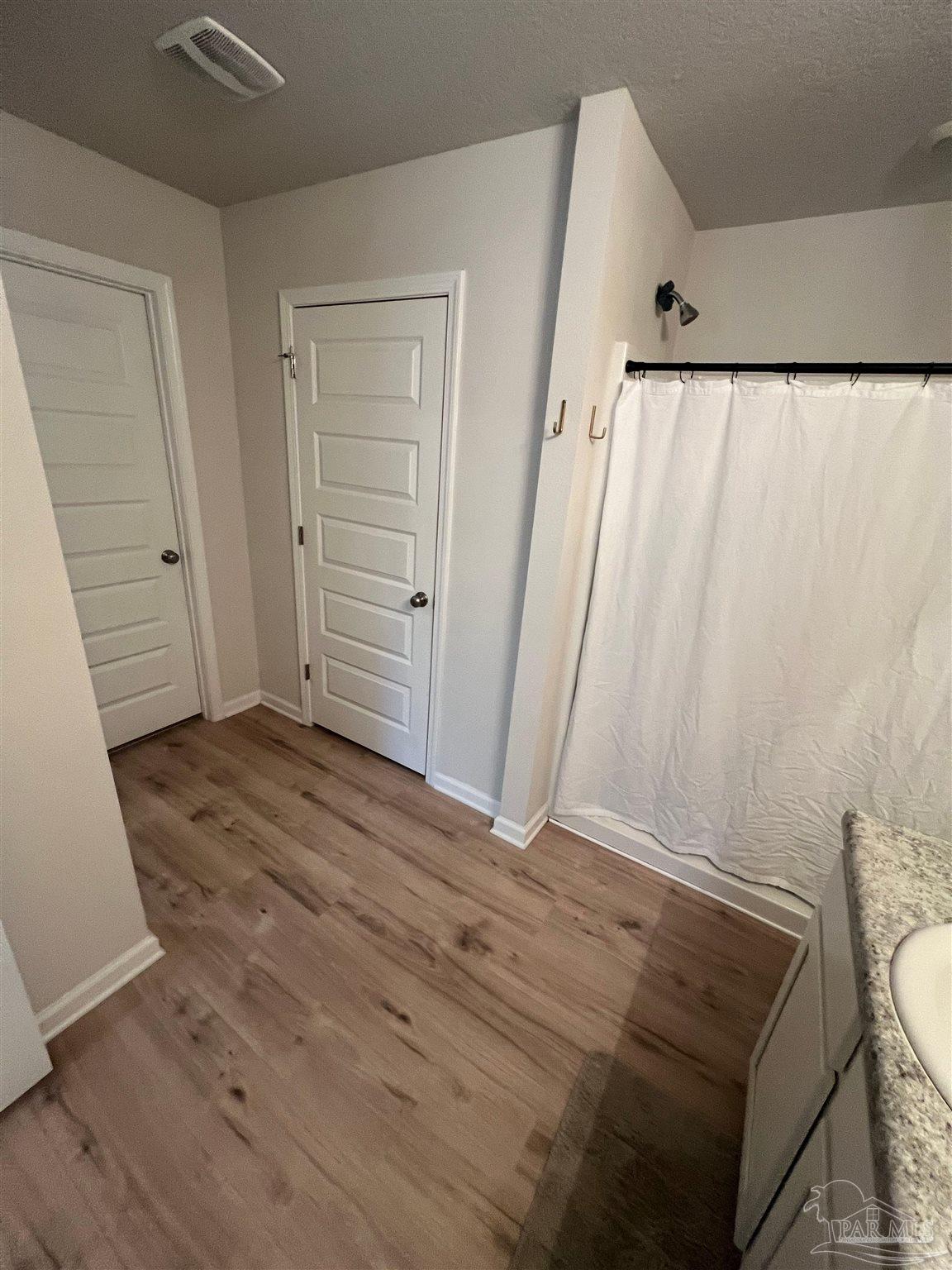 5253 Peach Drive Pace, FL 32571 - Photo 14 of 23 a view of bathroom