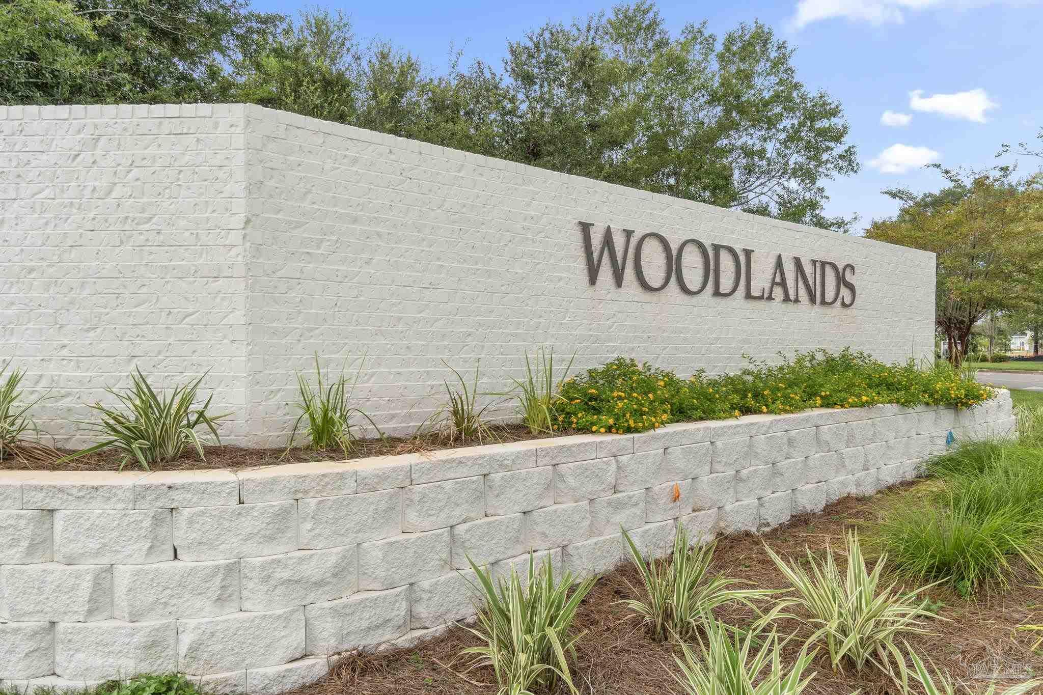 5253 Peach Drive Pace, FL 32571 - Photo 2 of 23 a view of a street sign