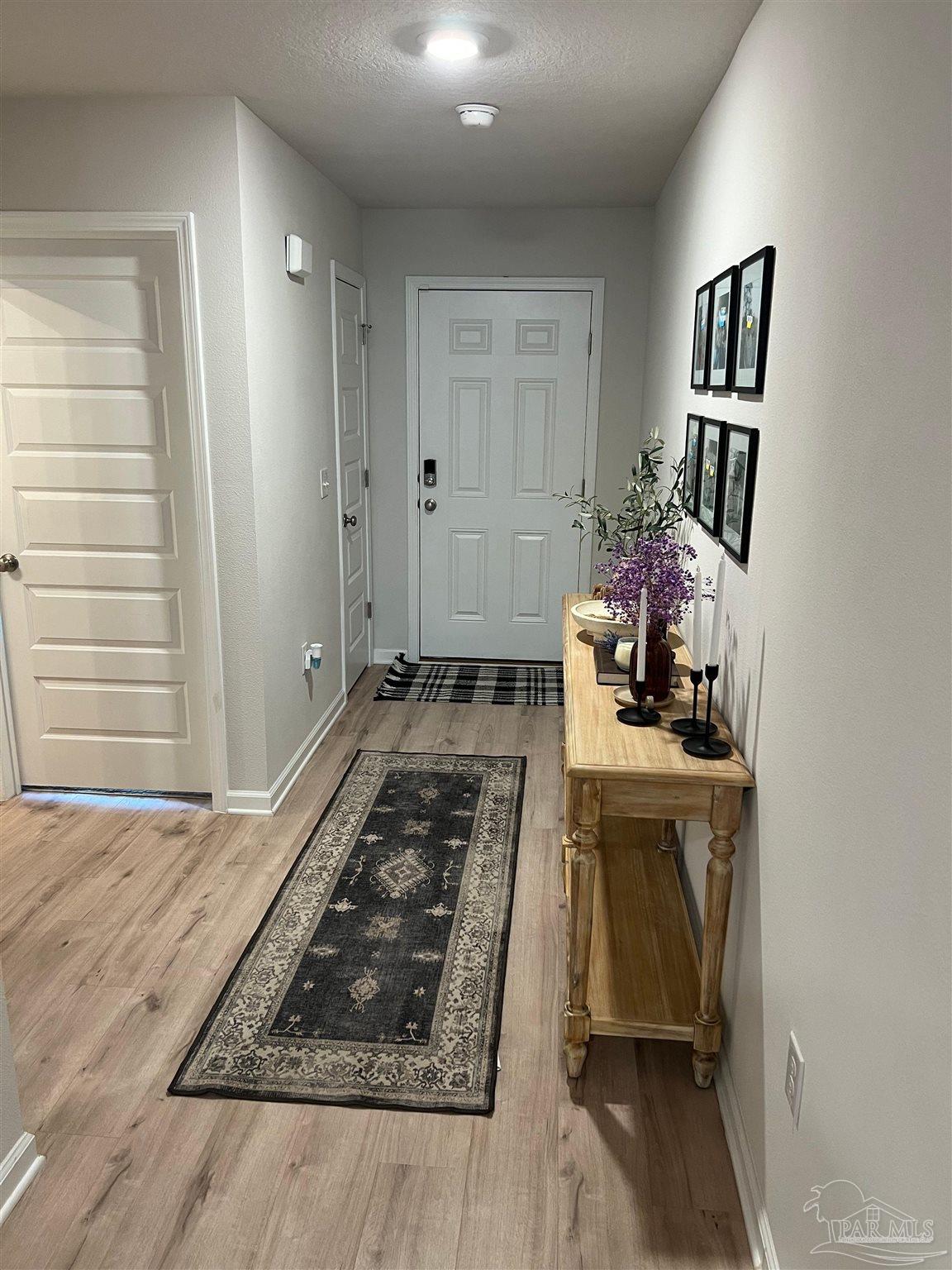 5253 Peach Drive Pace, FL 32571 - Photo 3 of 23 a room with storage and utility