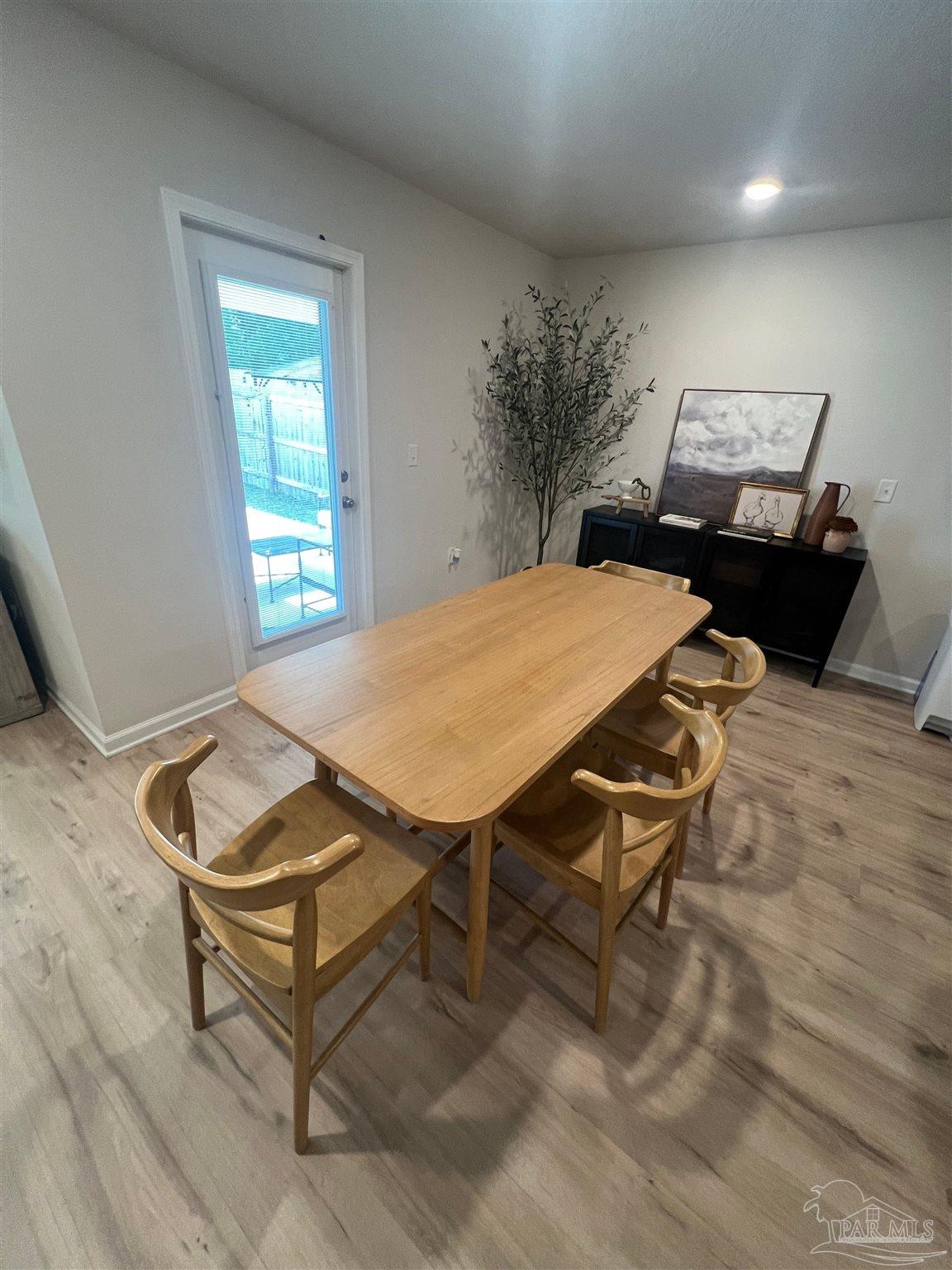 5253 Peach Drive Pace, FL 32571 - Photo 6 of 23 a room with furniture pool table and window