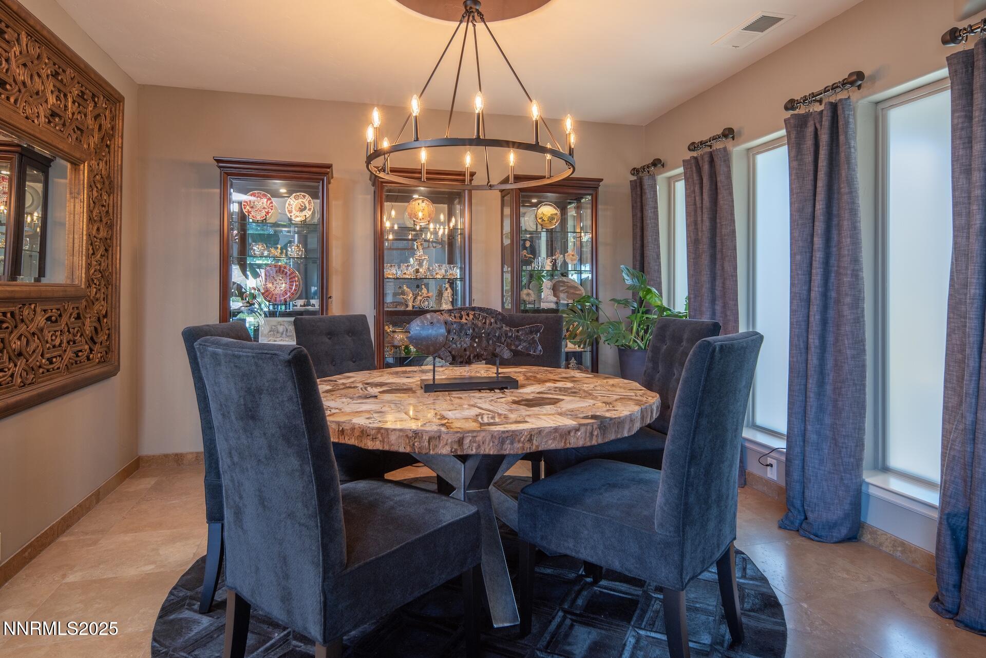 4905 Mountainshyre Road Reno, NV 89519 - Photo 16 of 64 a view of a dining room with furniture window and wooden floor