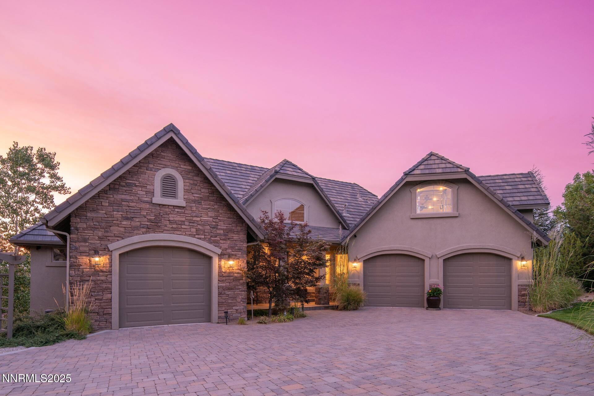 4905 Mountainshyre Road Reno, NV 89519 - Photo 3 of 65 a front view of a house with a yard
