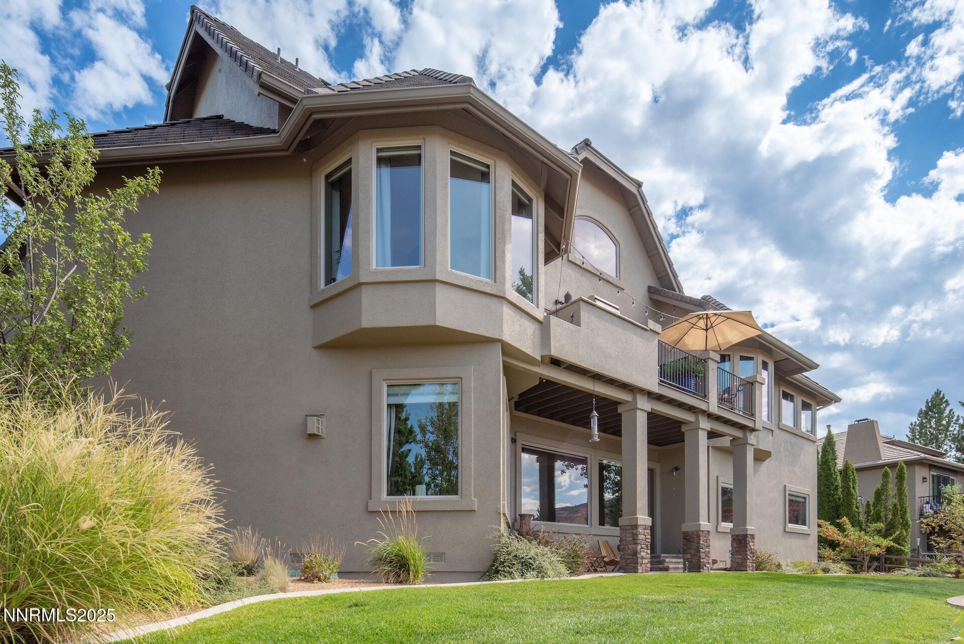 4905 Mountainshyre Road Reno, NV 89519 - Photo 53 of 65 a front view of a house with a garden