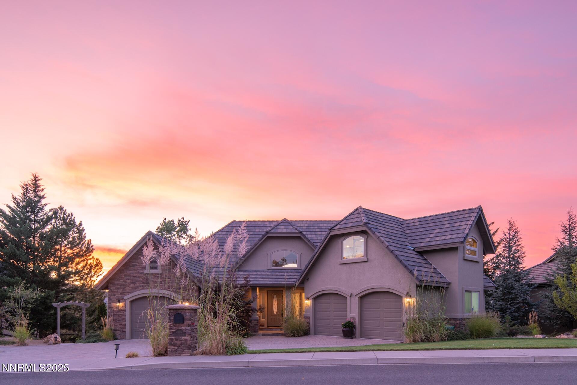 4905 Mountainshyre Road Reno, NV 89519 - Photo 63 of 65 a front view of a house with a yard