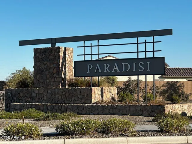 a view of a street sign under an umbrella