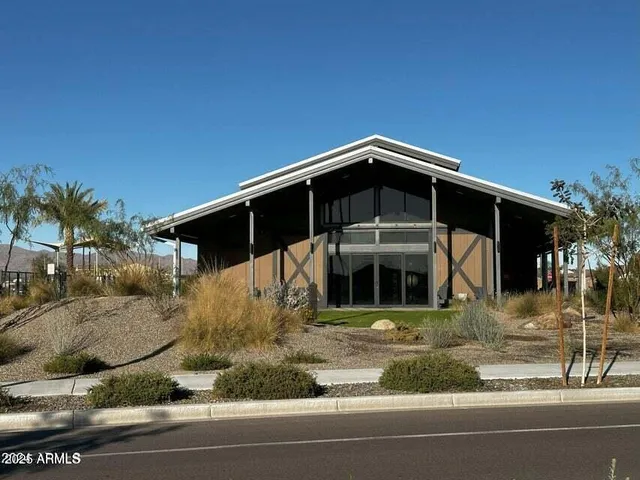 a view of a swimming pool with a lake view