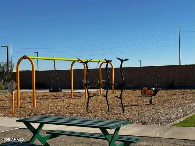 a view of a swimming pool with a lounge chair