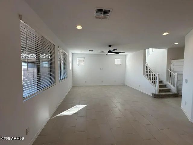 a view of a livingroom with a staircase