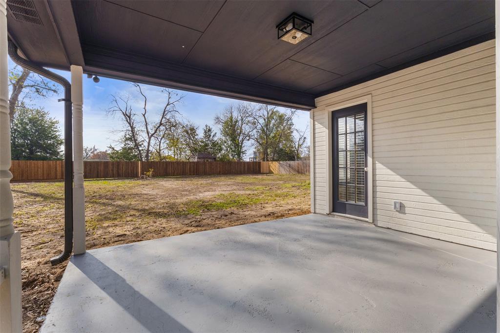 701 Rosehill Road Terrell, TX 75160 - Photo 16 of 20 a view of an empty room with yard