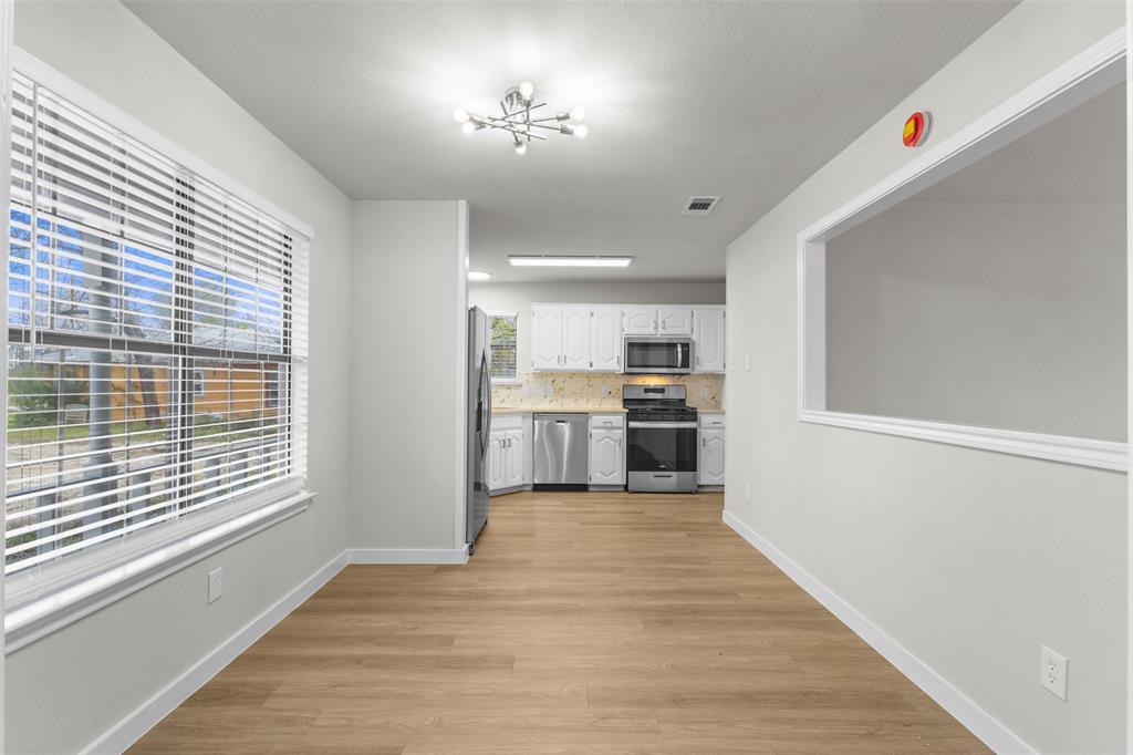 701 Rosehill Road Terrell, TX 75160 - Photo 4 of 20 a view of kitchen with wooden floor
