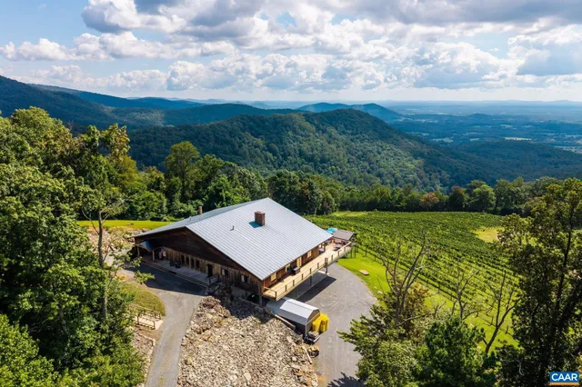 a view of swimming pool from a lake view