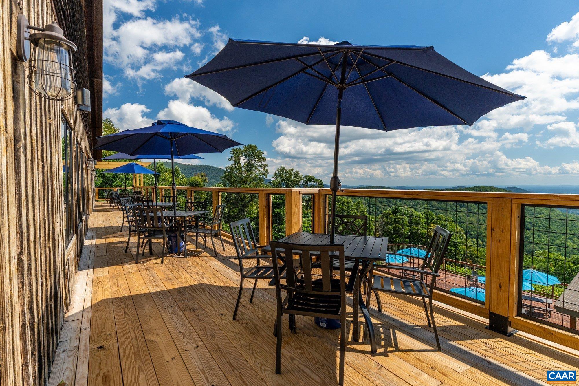 1376 Wyatt Mountain Road Dyke, VA 22935 - Photo 54 of 75 an outdoor view of patio with umbrella