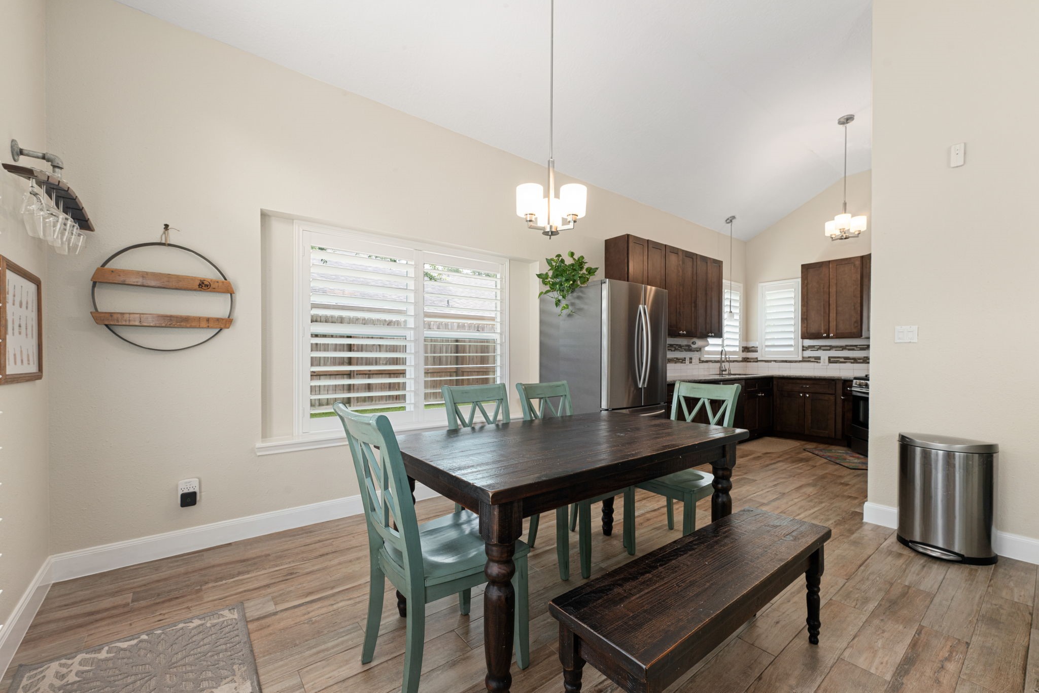 1915 Mercoal Drive Spring, TX 77386 - Photo 12 of 50 Open dining area seamlessly connected to the kitchen, ideal for everyday living and entertaining.