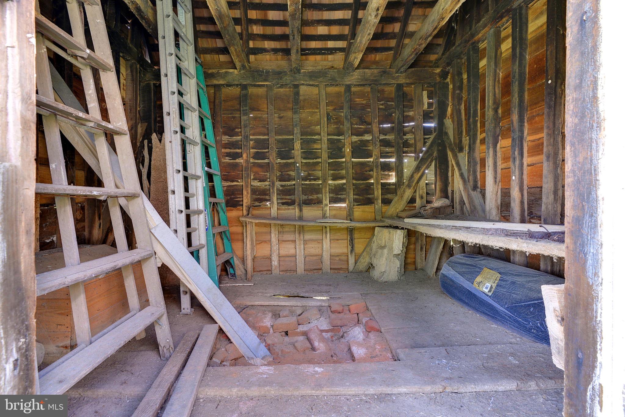 2459 Dunbrooke Road Tappahannock, VA 22560 - Photo 74 of 85 a view of an empty room with wooden floor