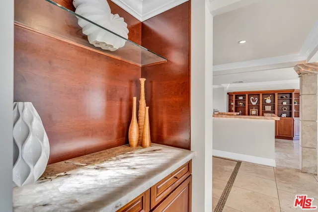 a view of a street with a large trees