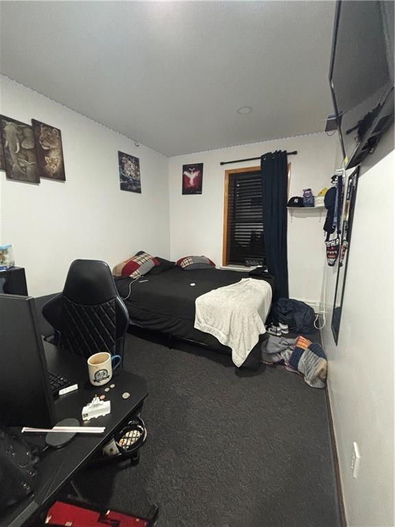 561 83rd Street Brooklyn, NY 11209 - Photo 4 of 6 a living room with furniture and a window